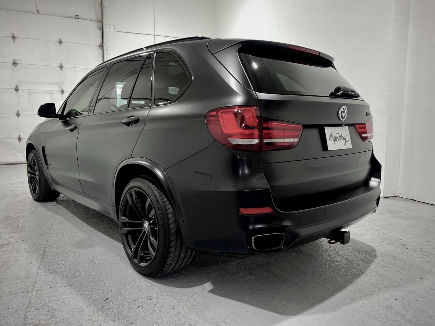 a matte black finish BMW